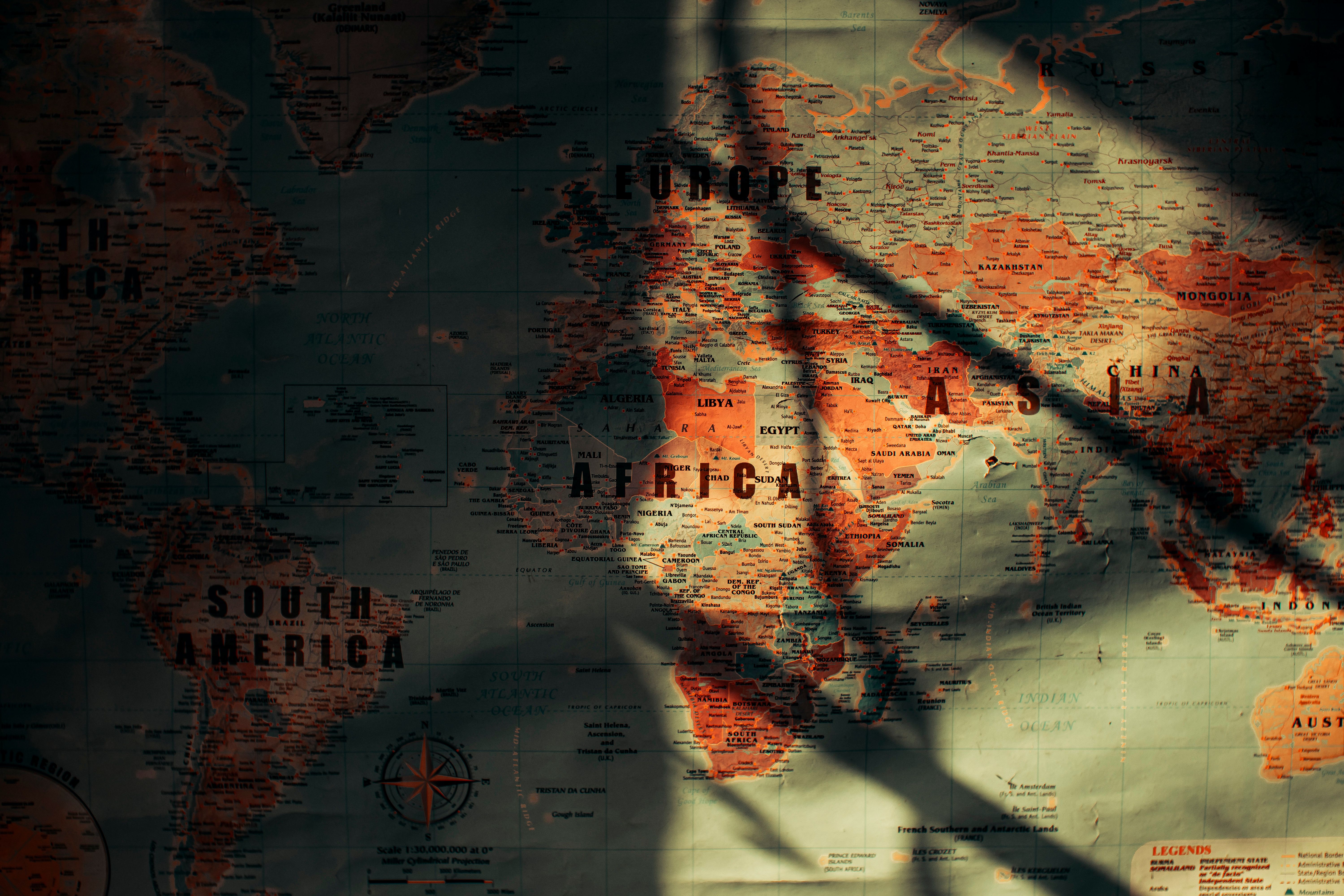 A world map viewed from above, illustrating comparisons of press freedom across countries